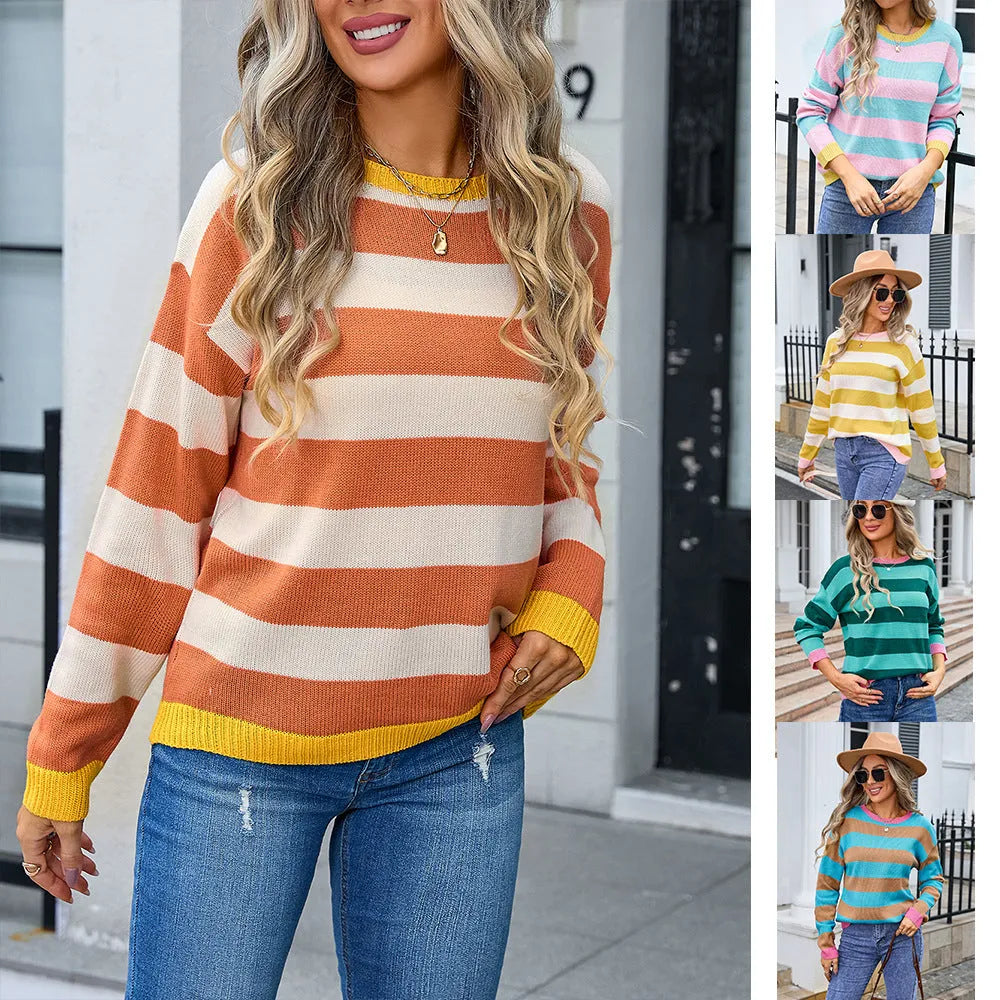 Women's loose fit long sleeve acrylic sweater in blue with a plaid pattern, featuring a round neck.