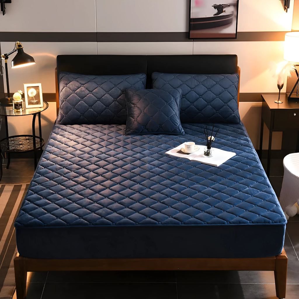 Crystal fleece padded bed cover in grey with quilted stitching and matching pillow case