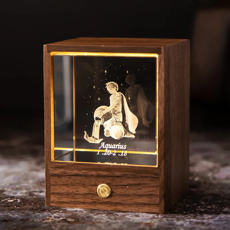 Crystal LED table lamp with black walnut base and K9 crystal showing constellation night light effect