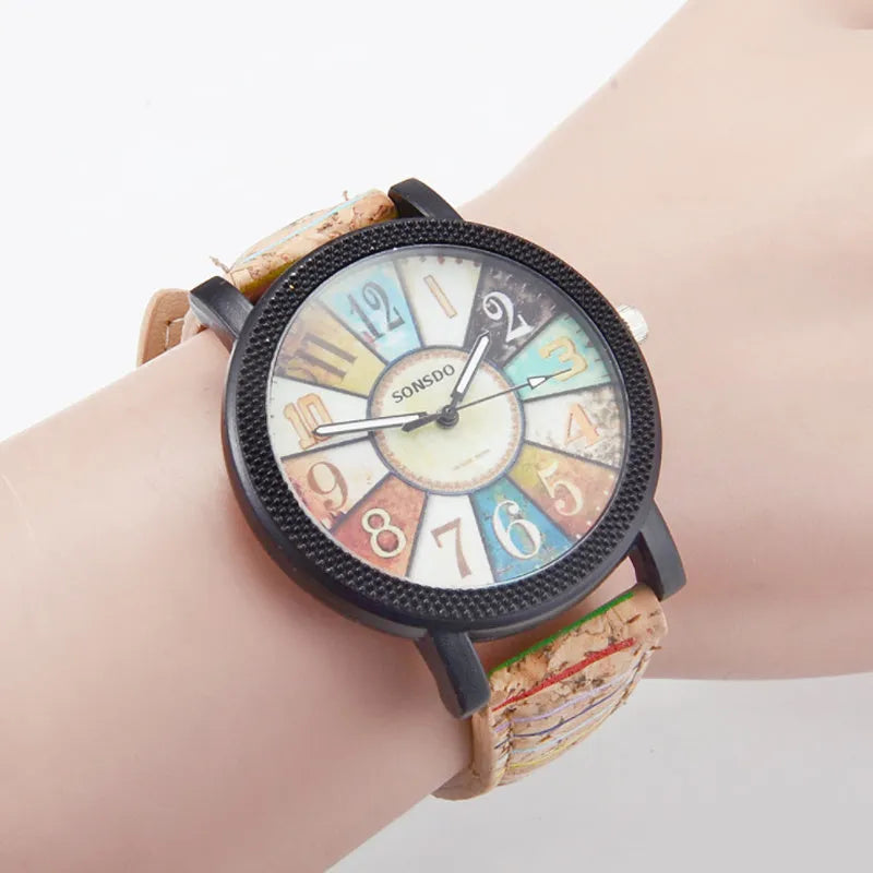 Casual vintage women's watch with brown leather strap and silver 37mm round dial.