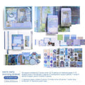 Retro-style creative journal gift box open to show A6 grid notebook, material papers, cards, stickers, and a water drop bookmark.