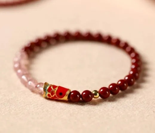Hand-woven unisex retro Koi bracelet with Purple Gold Sand, Strawberry Quartz, and crystal beads on display