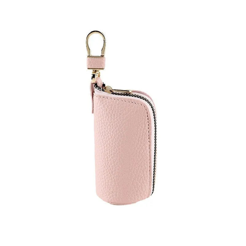 Minimalist waterproof PU leather key case with zipper closure in black, grey, and pink colours