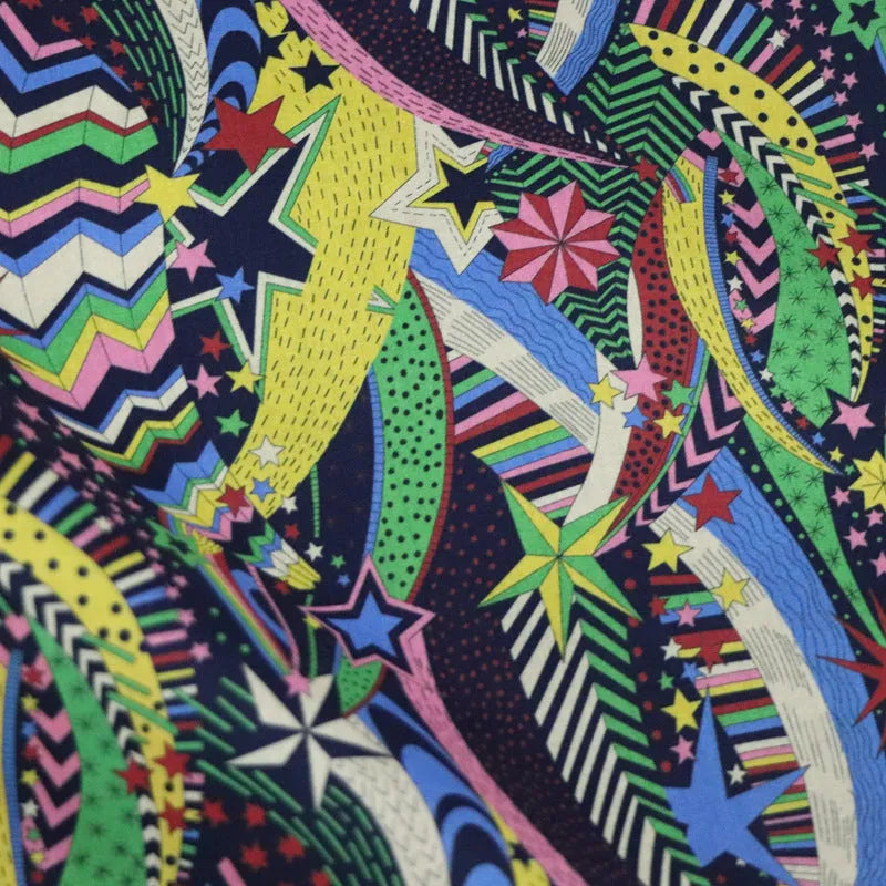 Blue cotton fabric with plant and flower digital print showing 145cm width measurement