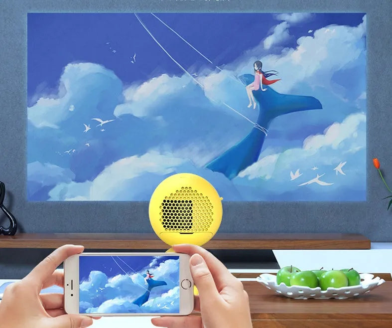YG220 portable LED projector in white or yellow colour showing 1080P input and 24-80 inch projection size.