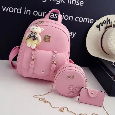 Women's black, grey, pink, or white 3-piece floral PU leather backpack, shoulder bag, and card wallet set.