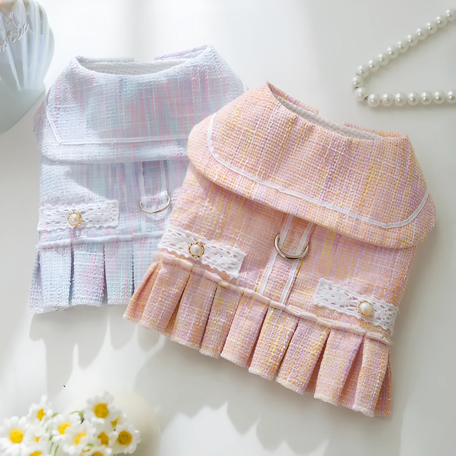 Polyester pet clothes for cats and small dogs in Salem purple or A & L pink colours with weight-based sizing