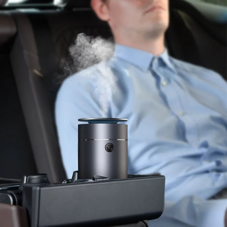 Dark gray column-shaped mini USB aromatherapy humidifier with 5W power and 0.5-1L reservoir for car and small room use
