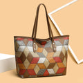 Women's large capacity PVC handbag in blue brown colour with sandwich pocket outer design