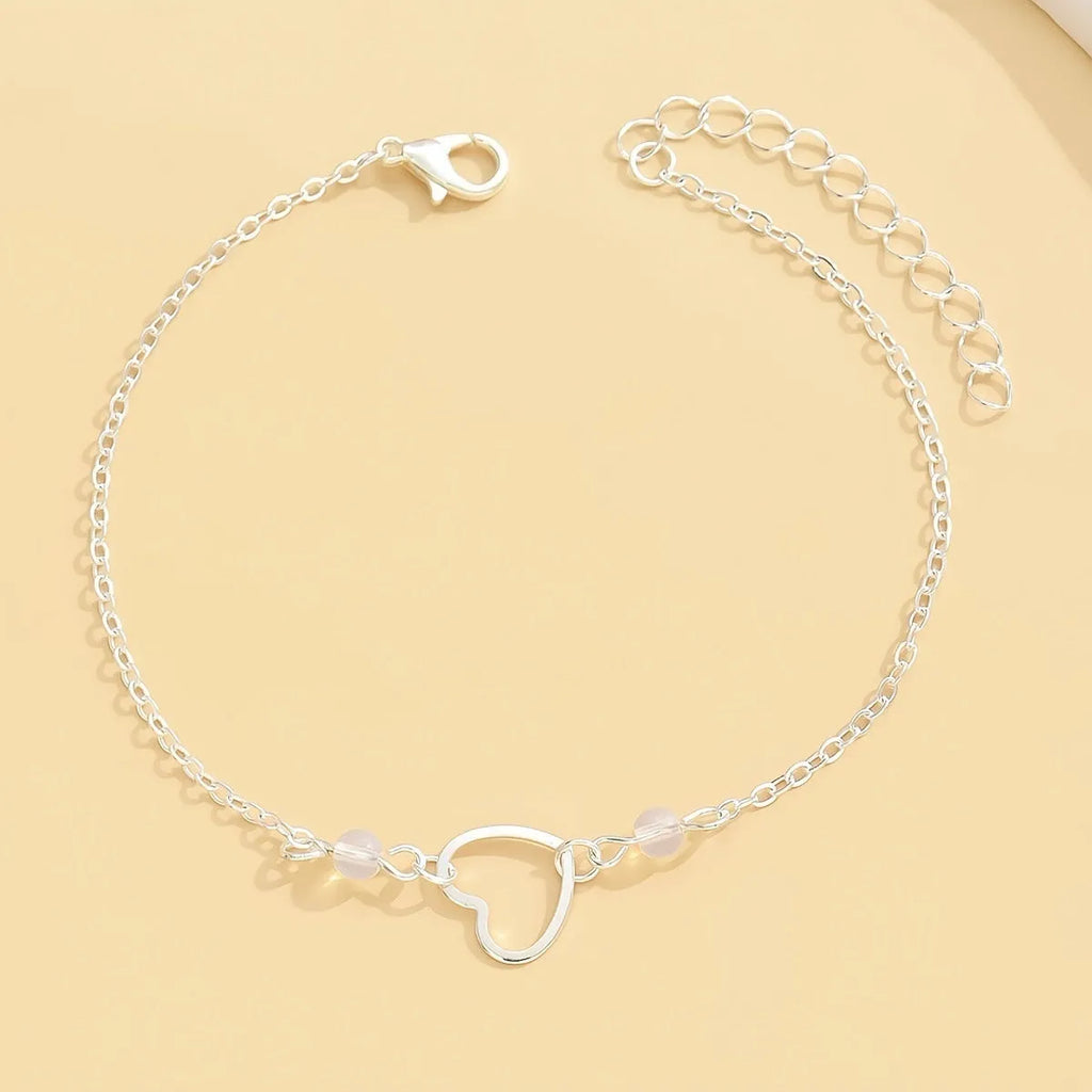 Women's adjustable ankle bracelet with heart-shaped geometric pendant in gold or silver alloy