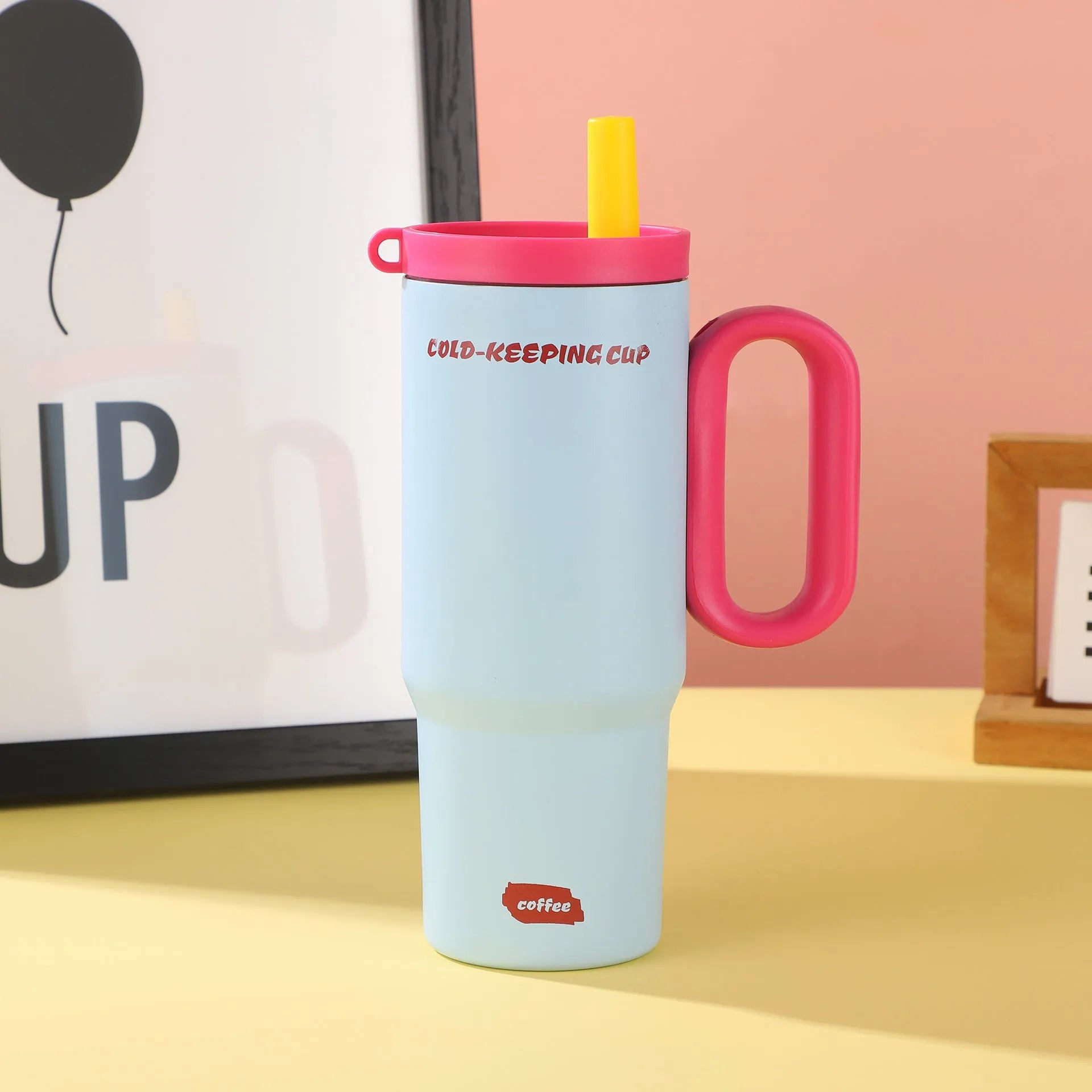 Portable ice bucket with large capacity, integrated straw cup, and handle in multiple colour options.