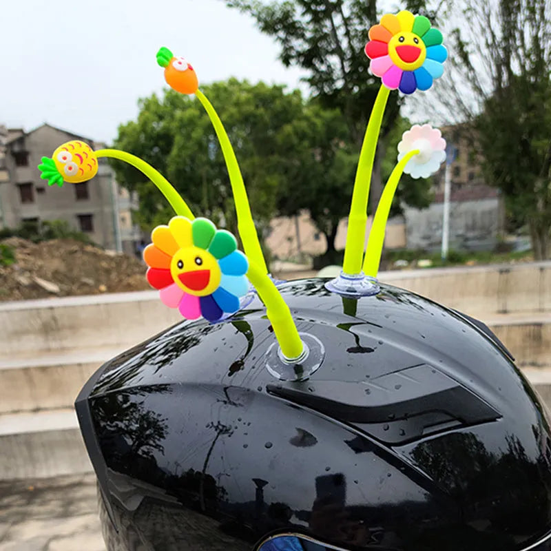 Yellow silicone sunflower helmet decoration with a suction cup on the back.