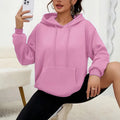 Women's loose grey drawstring hood sweatshirt with a front kangaroo pocket on a hanger.