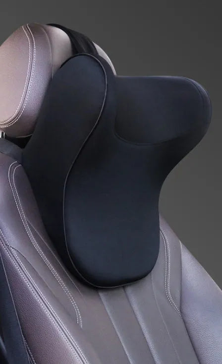 Car headrest and lumbar support cushion set in gray on a car seat