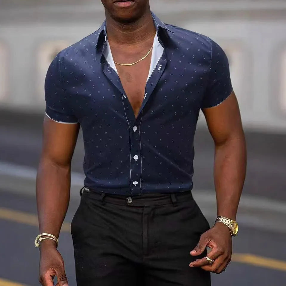 Men's light blue short-sleeved casual shirt with a floral pattern, made from thin elastic polyester fabric.