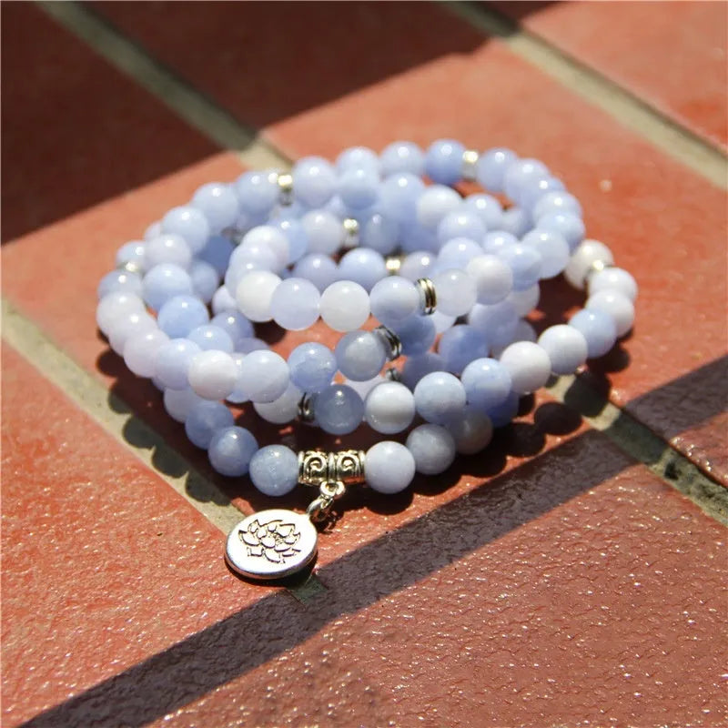 Natural stone women's bracelet with geometric lotus design shown in one of eight available colours