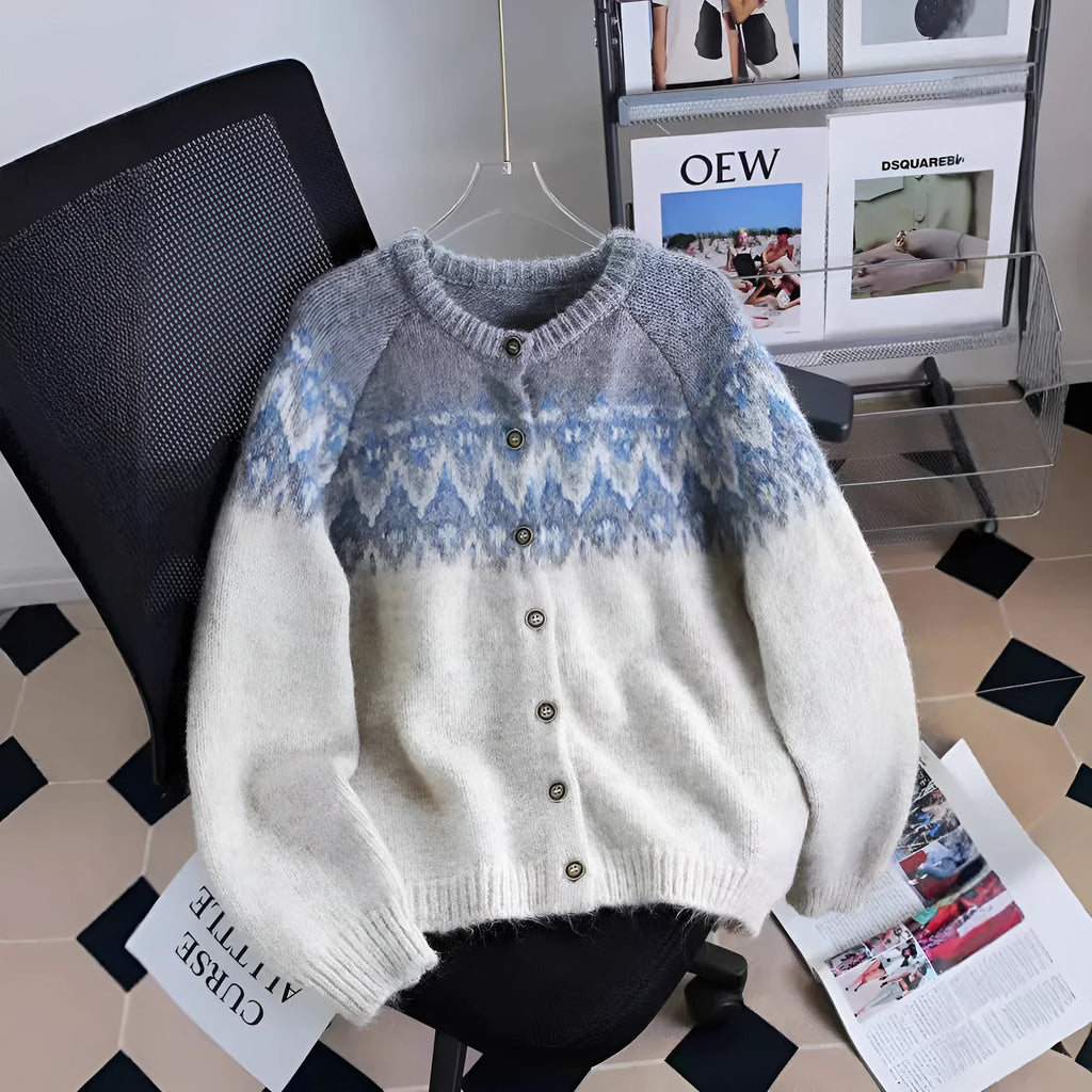 Women's loose-fit jacquard knit sweater coat in milky white, shown on a hanger.