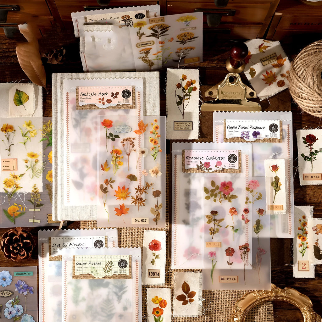 Huazhisen Series art sticker pack showing forest-themed label designs on transfer paper and cotton linen sheets.