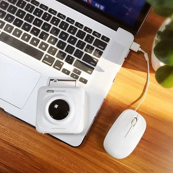 Paperang mini thermal printer in white with Bluetooth connectivity and compact 83x83x45mm size