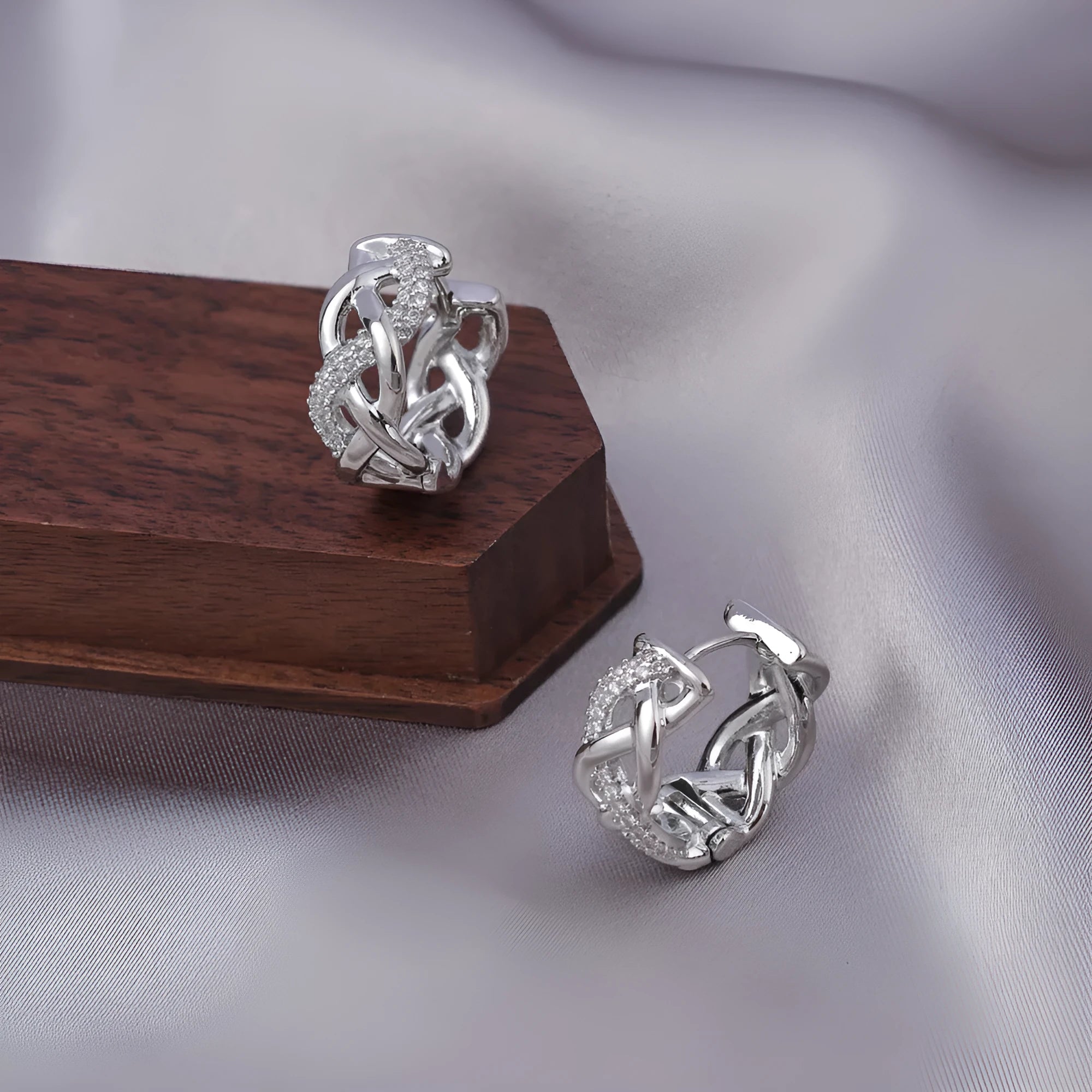 Pair of micro zircon-encrusted woven twisted stud earrings in gold real gold plating finish