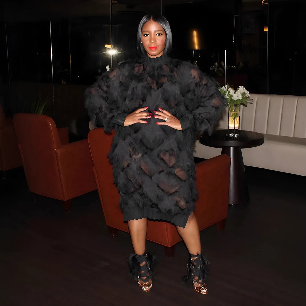 Black chiffon fringe loose mid-length dress with stand collar and long sleeves on a model