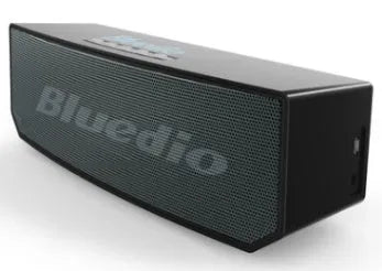 Black BS-6 cloud smart speaker with compact rectangular design on a surface.