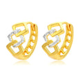 Gold geometric hollow-out alloy earrings for women on a plain background.