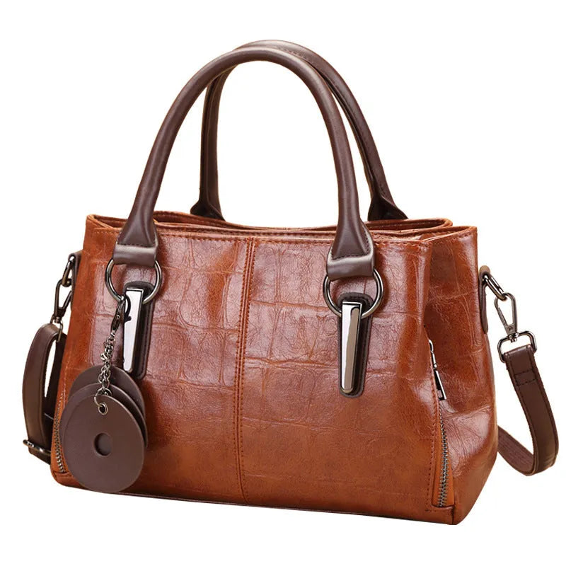 PU leather shoulder bag in vintage brown colour with internal organiser compartments and single strap