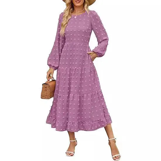 Beige women's high-waisted long sleeve dress with ruffled sleeves on a hanger.