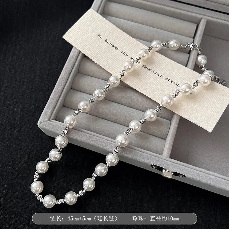 Women's 10mm pearl necklace with Mother Pearl shellfish geometric pendant on 45cm chain