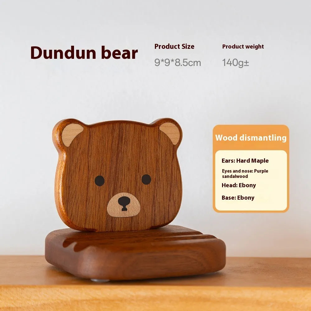 Creative Bunny Tatami Wooden Mobile Phone Stand with bunny design on a wooden desk