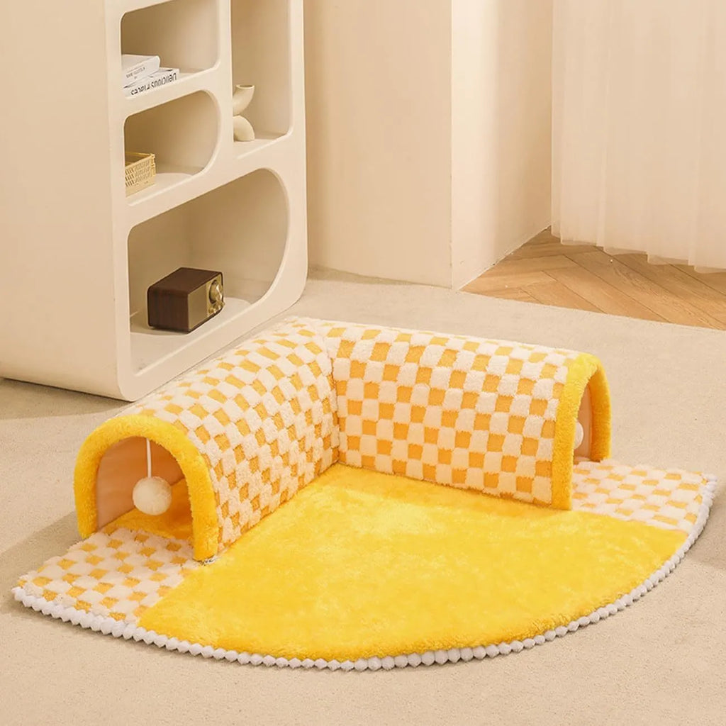 XL size plaid plush pet bed with attached tunnel for dogs and cats on a granular anti-slip base.