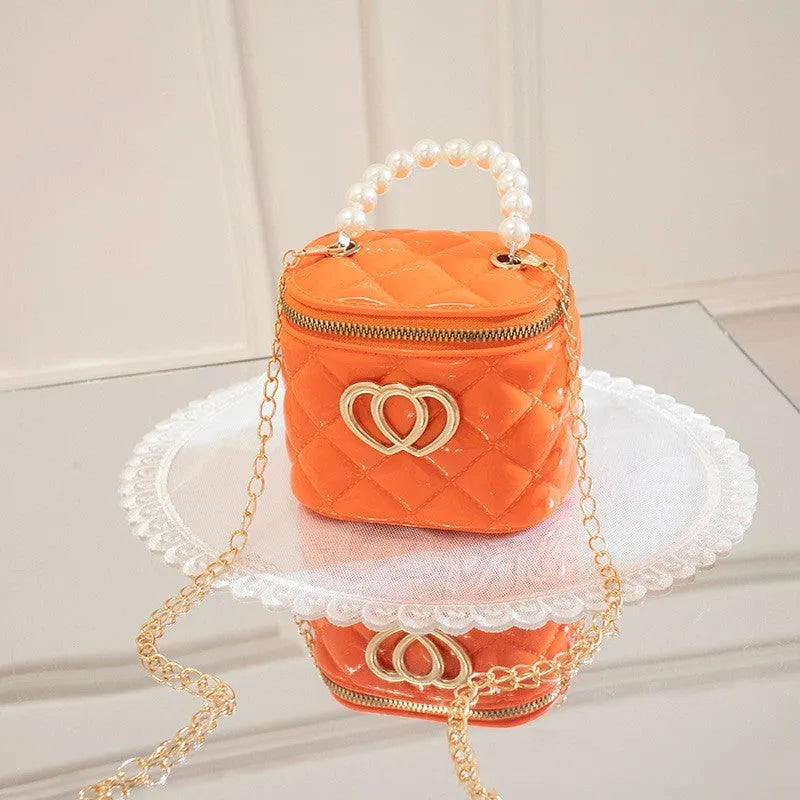 White heart-patterned PVC bucket gel bag for women showing bucket shape and heart design