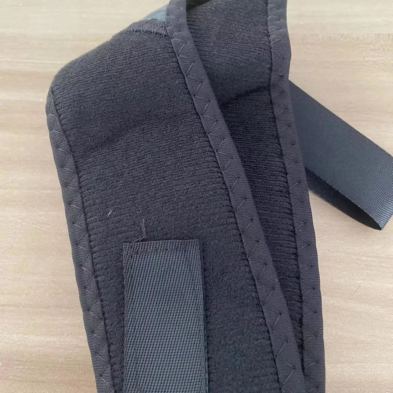 Babaka style nylon back correction posture support belt on a white background.