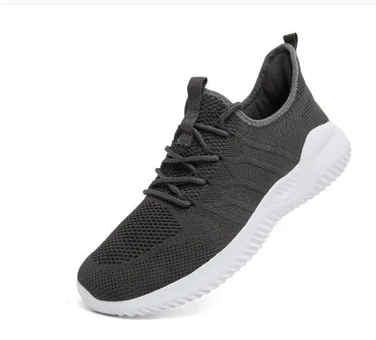 Men's black and white mesh sneakers with PVC soles and round toe design for casual spring wear