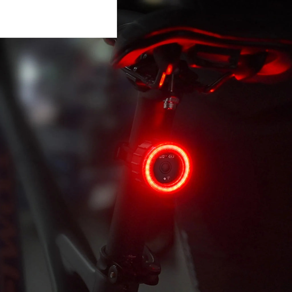 Black intelligent induction brake taillight for bicycles with aluminium alloy construction and dual mounting brackets