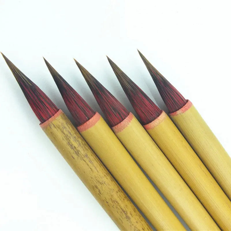 Red Chinese calligraphy brush with sheep hair and wolf tail blend on white background