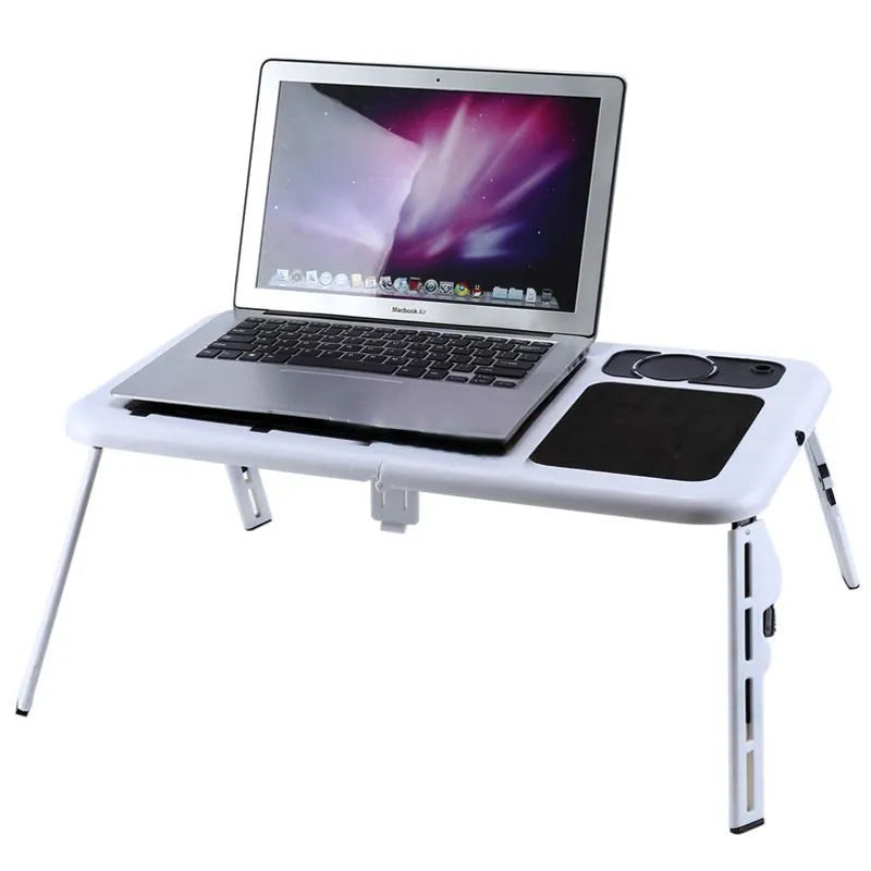 White folding ABS laptop desk with adjustable legs tilting baseplate on bed, folded size 285x316x36mm