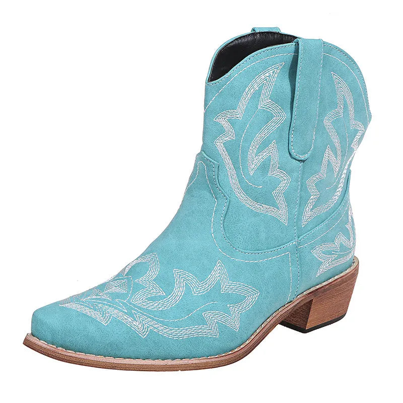 Blue women's cowboy boots with embroidery detail, wedge heel, and pointed toe.