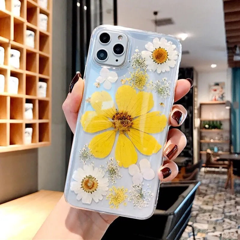 Slim TPU iPhone case with a large pink floral print on the back.