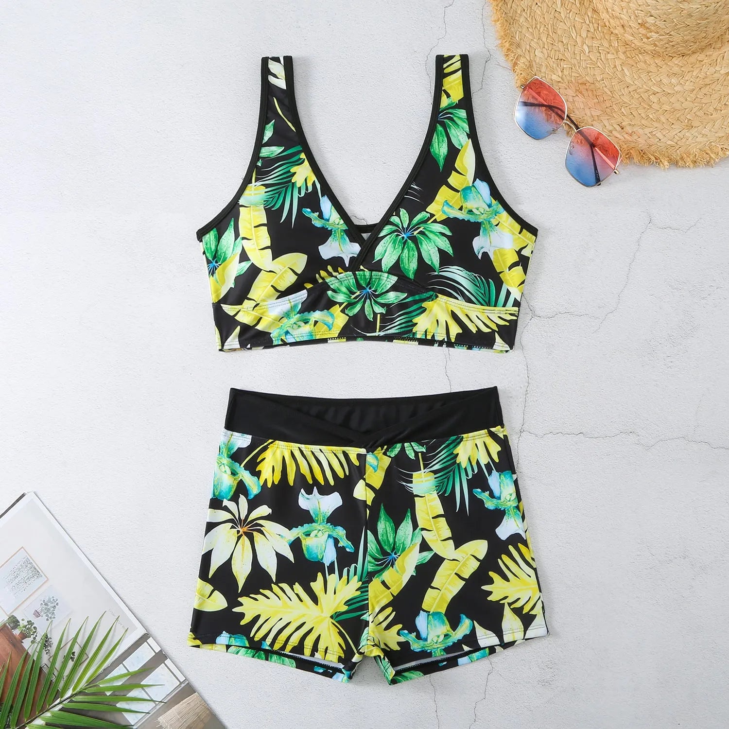 Women's two-piece swimsuit with printed boxer brief bottom and sleeveless top in multiple colour options