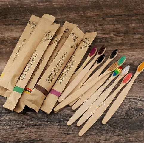 Set of 10 colourful bamboo toothbrushes with charcoal bristles for sustainable dental care