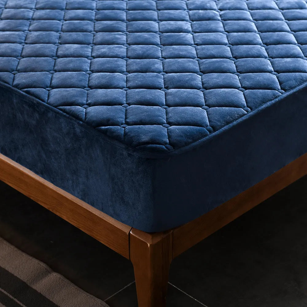 Crystal fleece padded bed cover in grey with quilted stitching and matching pillow case