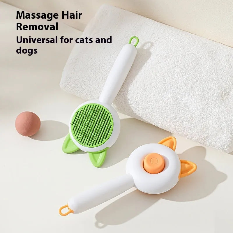 Greenish white and orange white self-cleaning cat comb with stainless steel bristles for pet hair removal.