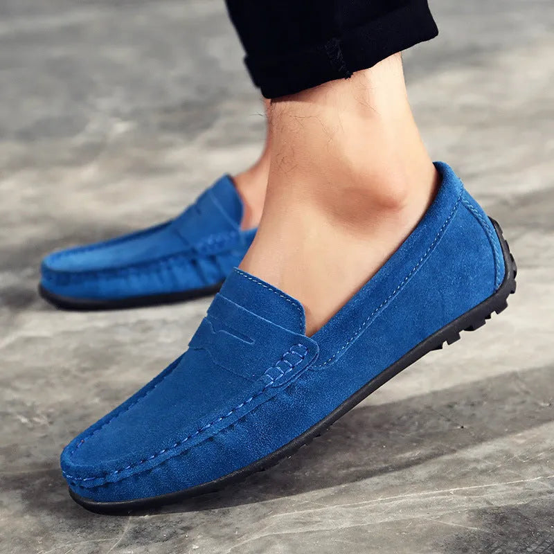 Men's suede leather Gommino loafer in brown, showing round toe and rubber sole.