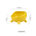 Green ceramic pet bowl with four legs and rounded splatter guard for cats and small dogs