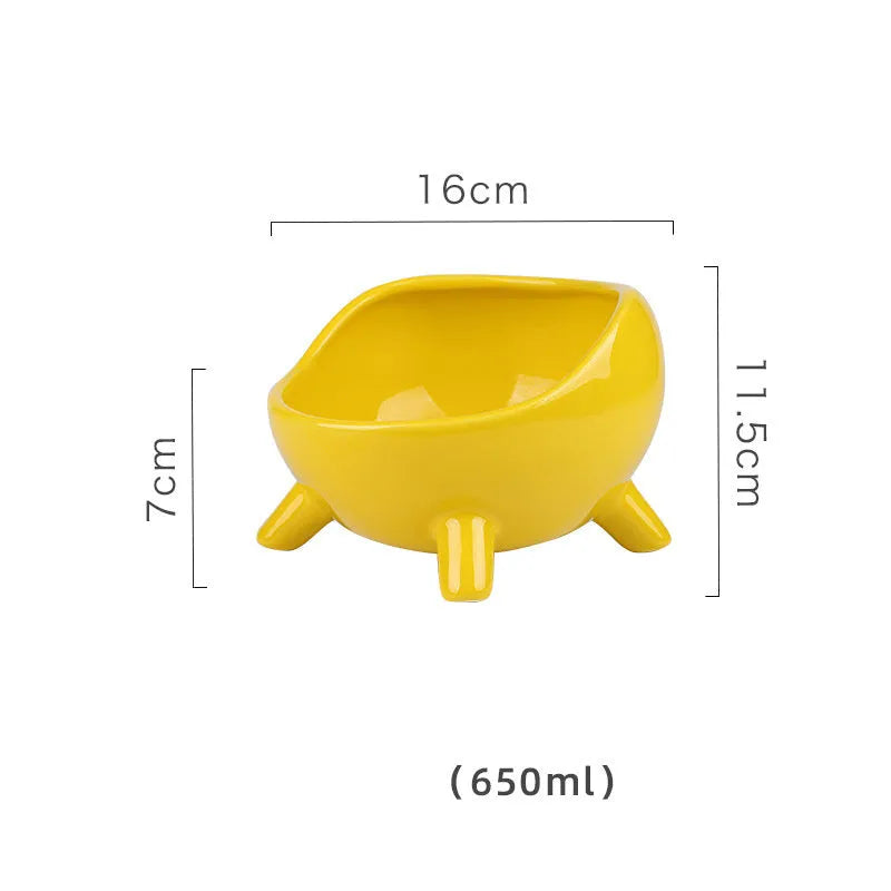 Green ceramic pet bowl with four legs and rounded splatter guard for cats and small dogs