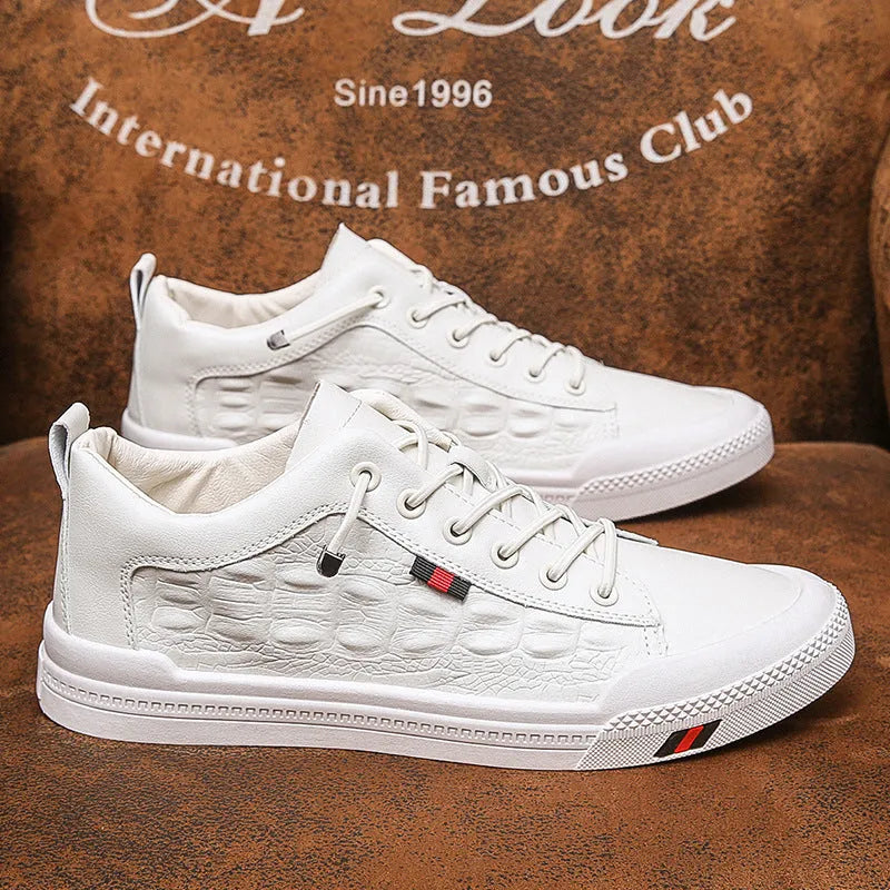 Men's white lace-up casual sneakers with PU leather upper and round toe on a rubber sole.