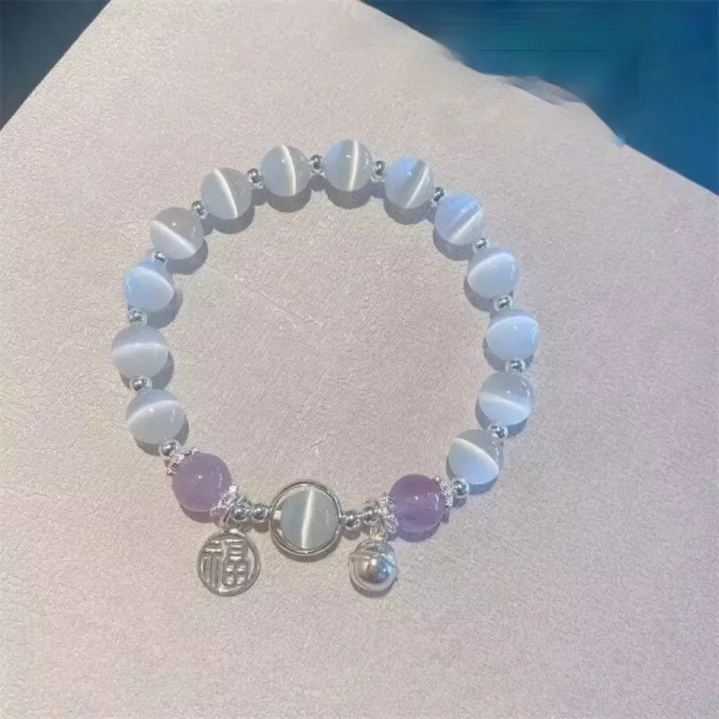 Glass bracelet with butterfly design and blessing card beads in moonlight colours