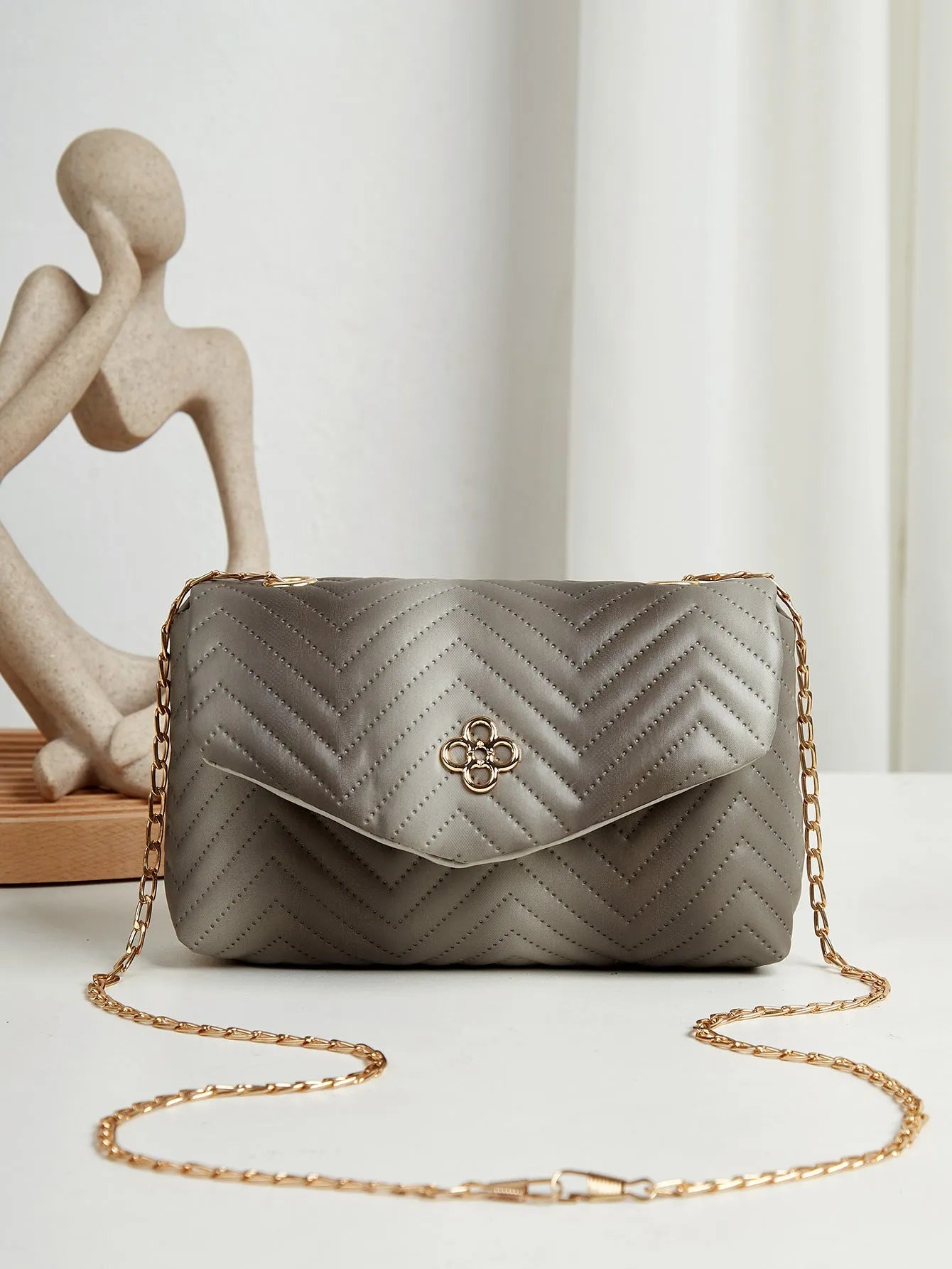 Soft PU clamshell bag with contrast colour pattern and single shoulder strap